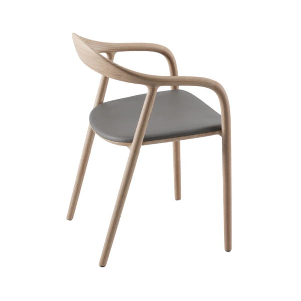 chaise neva artisan élégante sculpture lignes linéaires design sophistiqué confort en chêne massif et assise rembourrée